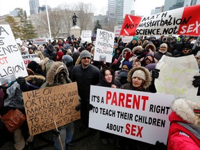 Demonstrators gathered at Queen's Park on Feb. 24 to protest the government's  new sex-ed curriculum. (MICHAEL PEAKE, Toronto Sun)