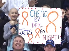 Alyx Delaloye of Neepawa was in the stands with her family, and a sign that read, “Chemo by day, Jets by night," at the game Feb. 24, 2015.