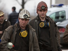 Miners arrive to help with the rescue effort in Zasyadko coal mine in Donetsk on Mar. 4, 2015. (REUTERS/Baz Ratner)