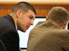 Aaron Hernandez consults his attorney during his murder trial in Fall River, Mass., March 4, 2015. (REUTERS/Dominick Reuter/Pool)