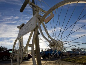 A ghost bike sits at the intersection of 137 Avenue and 131 Street in Edmonton, Alta., on Wednesday, November 12 2010. Edmonton Sun