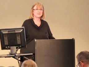 Bluewater Health's Deb Hook speaks at a Sarnia Lambton Workplace Wellness Committee workshop on substance abuse and the workplace Tuesday at Lambton College's event centre. More than 120 people attended. (TYLER KULA, The Observer)