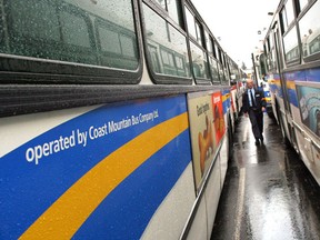 Parked vehicles in the Coast Mountain Bus Company's Oakridge bus yard.