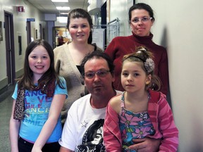 Martin Herbert with wife Melanie Duchesne and children Anne-Barbara, Marie-Josee and Megane. (MARINE-CHRISTINE NOEL/QMI Agency)