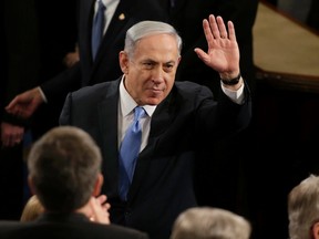 Israeli Prime Minister Benjamin Netanyahu arrives in the House Chamber prior to his address to a joint meeting of Congress in the House Chamber on Capitol Hill in Washington, March 3, 2015.  REUTERS/Gary Cameron