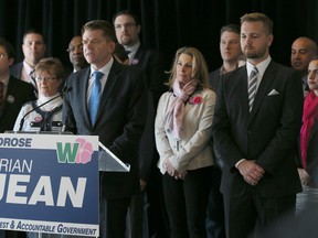 Brian Jean (C-behind microphone) at a media conference on Wednesday February 25, 2015 in Calgary, Alta announcing his bid to seek leadership of the Alberta Wildrose Party. Jim Wells/Calgary Sun/QMI Agency