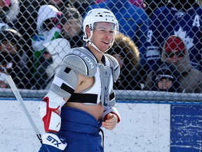 David Booth of the Maple Leafs is watched by a huge crowd during an outdoor practice earlier this season.