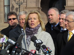 Ontario PC leadership candidate Christine Elliott with her supporters announces her economic platform outside Queen's Park on Thursday, March 5 2015. (ANTONELLA ARTUSO/Toronto Sun)