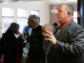 Edmonton police Det. Bill Allen speaks to the audience about fraud at the Edmonton Jewish Seniors Centre in Edmonton, Alta. on March 5, 2015.  Perry Mah/Edmonton Sun/