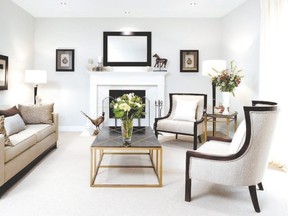 After: Colin and Justin stripped the room bare and added a new focal point fireplace, creamy carpet and a raft of tailored linen upholstery. Whisper grey beige paintwork and dark wood accessories evoke a traditional mood that buyers will find hard to resist.