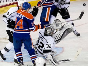 Jordan Eberle mixes it up with the defence in front of the Kings net during Tuesday's game. David Bloom, Edmonton Sun)