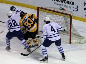 Kingston Frontenacs forward Sam Bennett gets between Mississauga Steelheads defencemen Brandon Devlin and Sean Day to score his second goal of the game in a 4-1 Kingston win at the Rogers K-Rock Centre on Wednesday night. (Steph Crosier/The Whig-Standard)