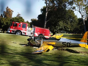 An airplane sits after crash landing at Penmar Golf Course in Venice California March 5, 2015. Celebrity web site TMZ reports the pilot was actor Harrison Ford, who was injured in the crash.  REUTERS/Lucy Nicholson