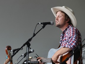 Del Barber performs at the 2013 Winnipeg Folk Festival.