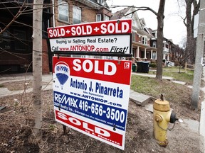 Real estate sold sign in Toronto in 2009. (Reuters files)