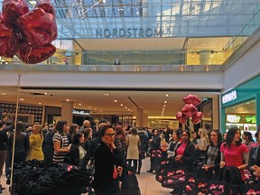 A throng of shoppers waits outside the Ottawa Nordstrom store Friday morning for its official opening. (DANI-ELLE DUBE Ottawa Sun)