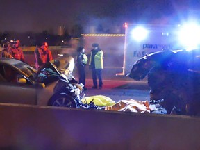 The OPP investigate the scene of a fatal accident on Hwy. 400 near Black Creek Dr. early in the morning of March 6, 2015. (Pascal Marchand/Special to the Toronto Sun)