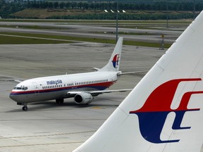 An aircraft of Malaysian Airline System taxis on the tarmac at Kuala Lumpur International Airport in Sepang in this February 26, 2007 file photo.  REUTERS/Bazuki Muhammad/Files