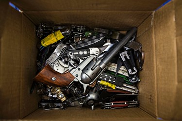 Confiscated items are seen at the Canada Border Services Agency office at the Edmonton International Airport in Leduc, Alta., on Thursday, March 5, 2015. Codie McLachlan/Edmonton Sun/QMI Agency