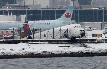 Delta flight 1086 is seen after it slid off the runway upon landing at New York's LaGuardia Airport March 5, 2015.   REUTERS/Mike Segar