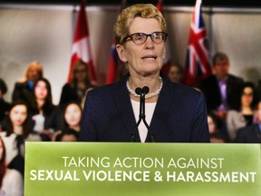 Premier Kathleen Wynne announces her new sexual violence and harassment action plan on March 5, 2015. (Veronica Henri/Toronto Sun)