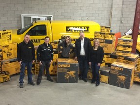 (Left to right) Richard Croke, DeWalt Canada; Brad Venoit, DeWalt Canada, Brittany McMahon, DeWalt Canada; Rob Voisin, VP of ReStore and Product Support, Habitat for Humanity Canada and Stephanie Ashton-Smith, National Manager Product Procurement for Habitat for Humanity Canada.