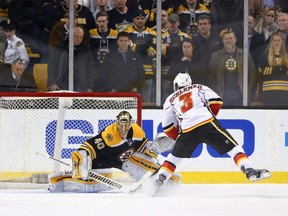 David Schlemko of the Calgary Flames takes a shot against Tuukka Rask #40 of the Boston Bruins at TD Garden on March 5, 2015. (Maddie Meyer/Getty Images/AFP)