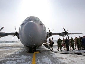 Some of the 33 Canadian Forces military police officers deploying to Egypt as part of Operation Calumet board a C-130J Hercules at 8 Wing/CFB Trenton, Ont. Friday morning, March 6, 2015. - JEROME LESSARD/THE INTELLIGENCER/QMI AGENCY