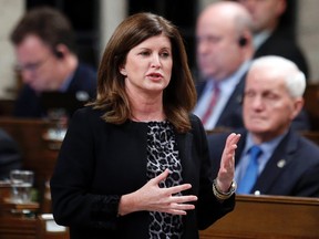 Health Minister Rona Ambrose speaks during Question Period in the House of Commons on Parliament Hill in Ottawa, Nov. 25, 2014. (CHRIS WATTIE/Reuters)