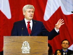 Prime Minister Stephen Harper speaks at a news conference in Richmond Hill, Ontario January 30, 2015. Canada's sweeping new anti-terror legislation would make it a crime for anyone to call for attacks on Canada and gives a much larger role to the government's main spy agency.  (REUTERS/Mark Blinch)