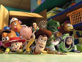 Toy Story 3 characters from left to right: Bullseye, Mr. Potato Head, Mrs. Potato Head, Jessie, Hamm, Barbie, Woody, Rex, Slinky Dog, Buzz Lightyear and Aliens. (Disney/Pixar photo)