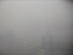 Buildings are seen from China Central Radio and Television Tower (CCTV Tower) on a polluted day in Beijing, January 15, 2015. (REUTERS/Kim Kyung-Hoon)