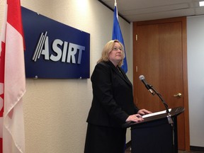 Alberta Serious Incident Response Team Executive Director Susan Hughson speaks about two Edmonton Police Service officers facing charges after an investigation into trafficking of steroids at ASIRT offices at 9915 108 Street on Friday, March 6, 2015. Catherine Griwkowsky/Edmonton Sun/QMI Agency