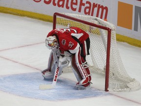 Ottawa Senators goalie Andrew Hammond is dejected  after a second goal during the first period against the Buffalo Sabres in Ottawa Friday March 6, 2015. (Tony Caldwell/Ottawa Sun/QMI Agency)