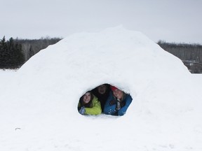 On Feb. 26, 75 students from three schools in Parkland School Division stayed overnight at Camp YoWoCha in Wabamun as part of a new recreational and wellness course. Here, staff and students sit inside a quinzhee (made from firmly packed snow) that they made during the retreat. - Karen Haynes, Reporter/Examiner