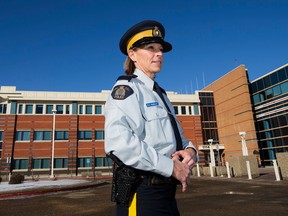 RCMP recruiter Cpl. Barb Hemsley poses for a outside RCMP K Division, in Edmonton Alta., on Saturday March 7, 2015. The RCMP wants to recruit 960 women this year, with a goal of 1,200 for next year. David Bloom/Edmonton Sun/QMI Agency