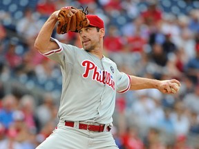 Philadelphia Phillies pitcher Cliff Lee (33) throws during the first inning against the Washington Nationals at Nationals Park July 31, 2014. (Brad Mills/USA TODAY Sports)