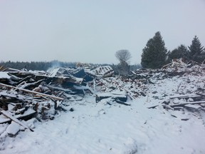 A farm house on 5224 Limebank Rd. in Manotick burned to the ground early Sunday, March 8, 2014. Milan Fait, the owner of the home, is away in Cuba and no one was injured in the blaze. Firefighters haven't determined a cause of the fire.
(Keaton Robbins/Ottawa Sun)