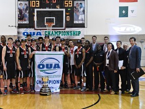 Carleton Ravens pose for photo after winning their OUA Wilson Cup Final Four Championship game against the Windsor Lancers at the University of Ottawa on Saturday, March 7, 2015. (Matthew Usherwood/Ottawa Sun)