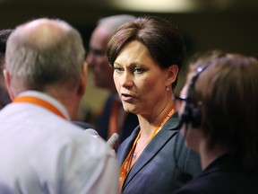 Theresa Oswald speaks with media after her bid to become leader of the New Democratic Party failed during the annual general convention at Canad Inns Polo Park on Sun., March 8, 2015. Kevin King/Winnipeg Sun/QMI Agency