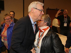Manitoba NDP leadership candidate Greg Selinger (l) is hugged by a supporter after winning the leadership in the second ballot in Winnipeg, Man. Sunday March 08, 2015.
Brian Donogh/Winnipeg Sun/QMI Agency