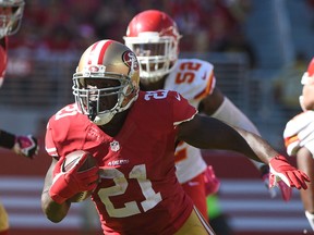 San Francisco 49ers running back Frank Gore (21) runs away from Kansas City Chiefs inside linebacker James-Michael Johnson (52) during the third quarter at Levi's Stadium. (Kyle Terada/USA TODAY Sports)