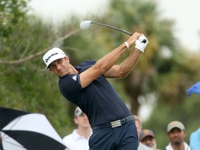 Dustin Johnson hits a tee shot during the final round of the WGC - Cadillac Championship at TPC Blue Monster at Trump National Doral. (Jason Getz/USA TODAY Sports)