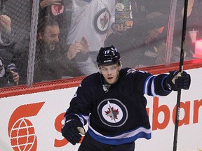 Jets winger Adam Lowry. (BRIAN DONOGH/Winnipeg Sun files)