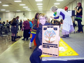 Anne Ennes accepted the AppreSHEation Award Friday, March 6, 2015, on behalf of the Oxford District Women's Institute during International Women's Day celebration in Woodstock, Ont. (HEATHER RIVERS/SENTINEL-REVIEW​)