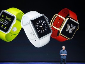 Apple CEO Tim Cook speaks about the Apple Watch during an Apple event at the Flint Center in Cupertino, California, in this September 9, 2014 file photo. Apple will be unveiling the Watch, its first new product in half a decade, at an event on March 9. (REUTERS/Stephen Lam/files)