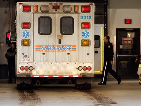 EMTs walk back to their ambulance inside the Emergency bay at the University of Alberta (U of A ) Hospital at 8440 112 St., in Edmonton on Wednesday January 19, 2012.  TOM BRAID/EDMONTON SUN