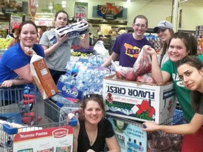St. Michael Catholic students Kim von Euw (left), Kate Brooks, Shannon Blaine, Jenna Rops, Alyssa Cronin (of St. Anne’s), Regan Devlin and Shannon Mazzanti are seen at a grocery store during their mission trip to Mexico. SUBMITTED PHOTO