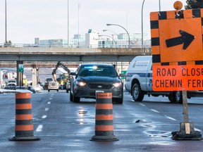 A broken watermain underneath Riverside Dr. just south of the 417 has resulted in nearby buildings being without water and has caused major traffic problems. Errol McGihon/Ottawa Sun/QMI Agency