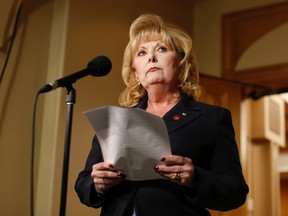 Suspended Senator Pamela Wallin delivers a statement to journalists about an audit examining her expenses on Parliament Hill in Ottawa August 12, 2013.     REUTERS/Chris Wattie